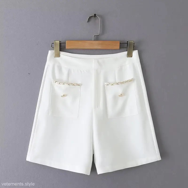 White shorts with chain-trimmed pockets from the Gorgeous Yacht Fit Suit Cardigan Short collection