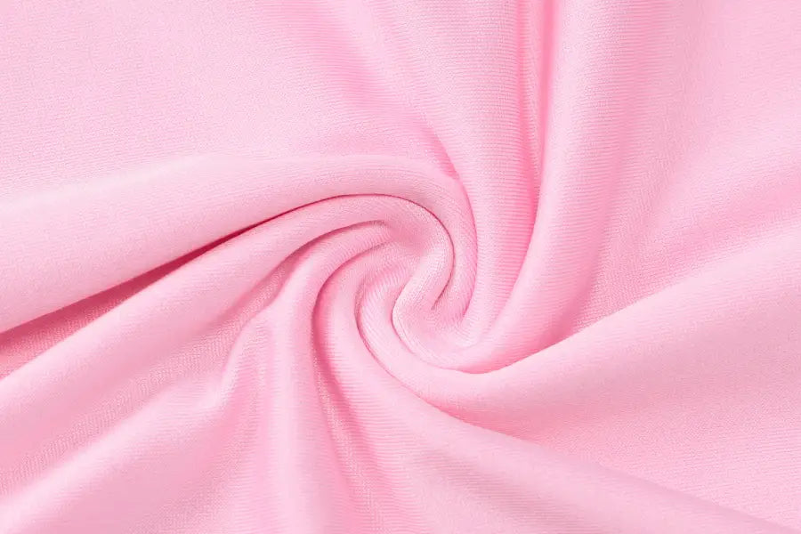 Swirling pink fabric of Halterneck Deep V Ruffled Dress with free shipping option