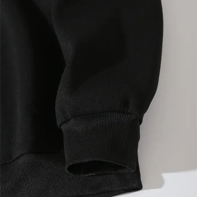 Black sleeve cuff with thumb hole on Hawkins Cute Sweater for Fall Winter Korean style