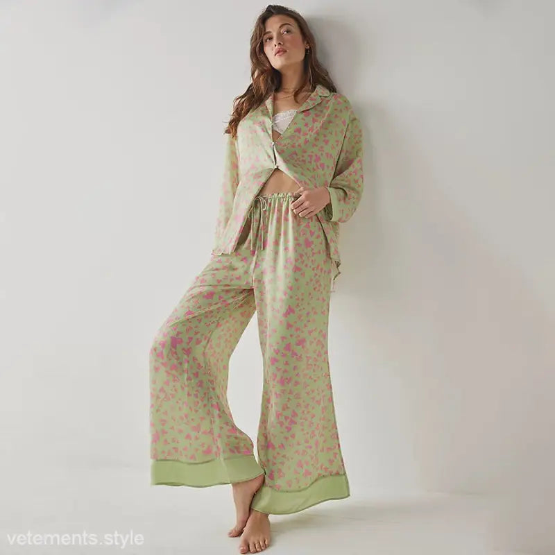 Woman in floral heart printing pajamas two piece set with wide-leg pants for comfort