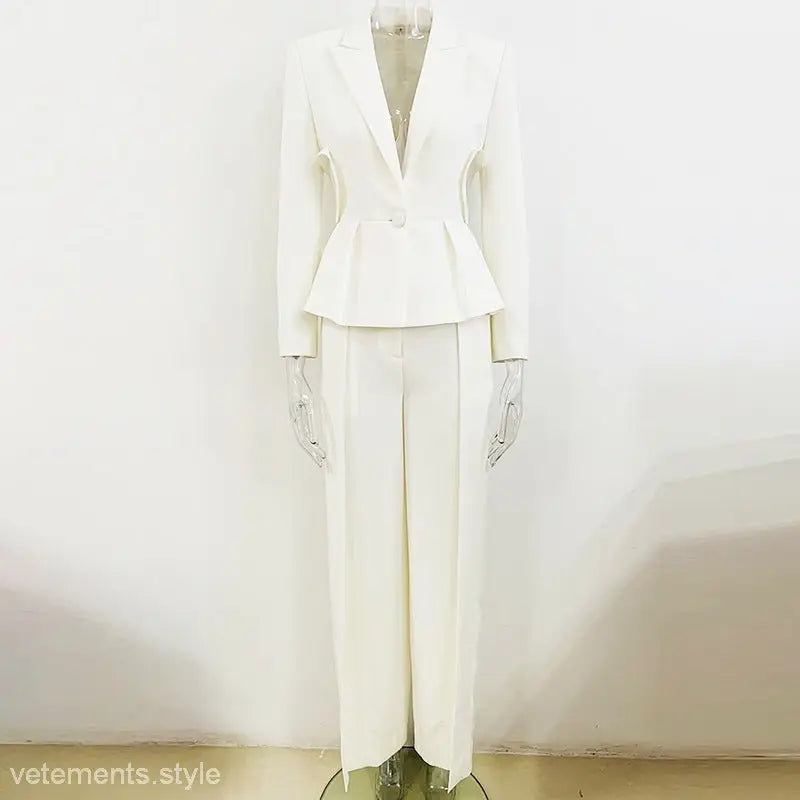White women’s pantsuit with a fitted peplum jacket and wide-leg trousers, perfect for a shaped slim fit office look