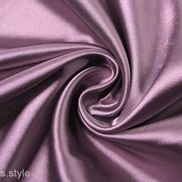 Swirled purple satin fabric with smooth, shiny texture on high grade halter dress