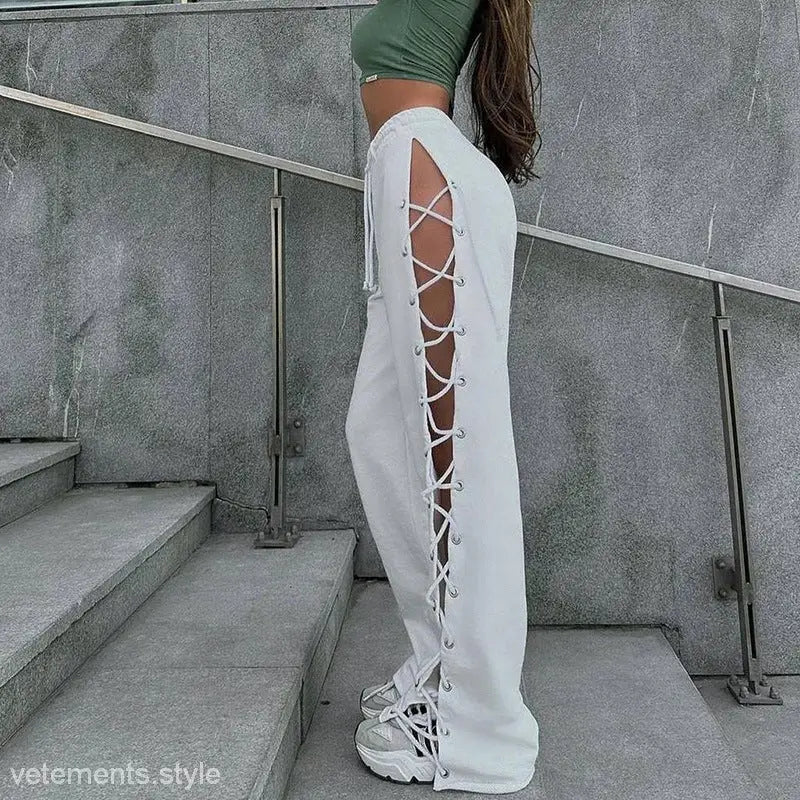 White high rise jersey summer pants with full-length side lacing and street slim fit