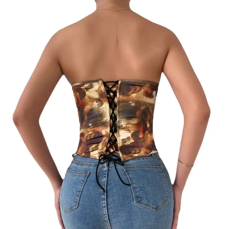 High waist corset top with steel ring boning, camouflage print, and lace-up back