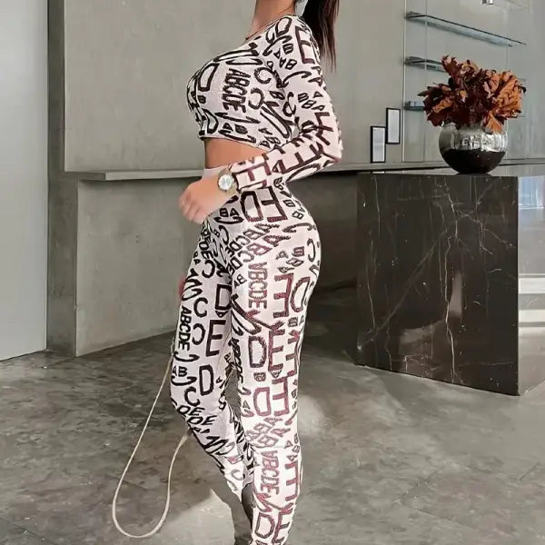 Woman in patterned athletic wear showcasing High Waist Hip Lift Leggings for elegance