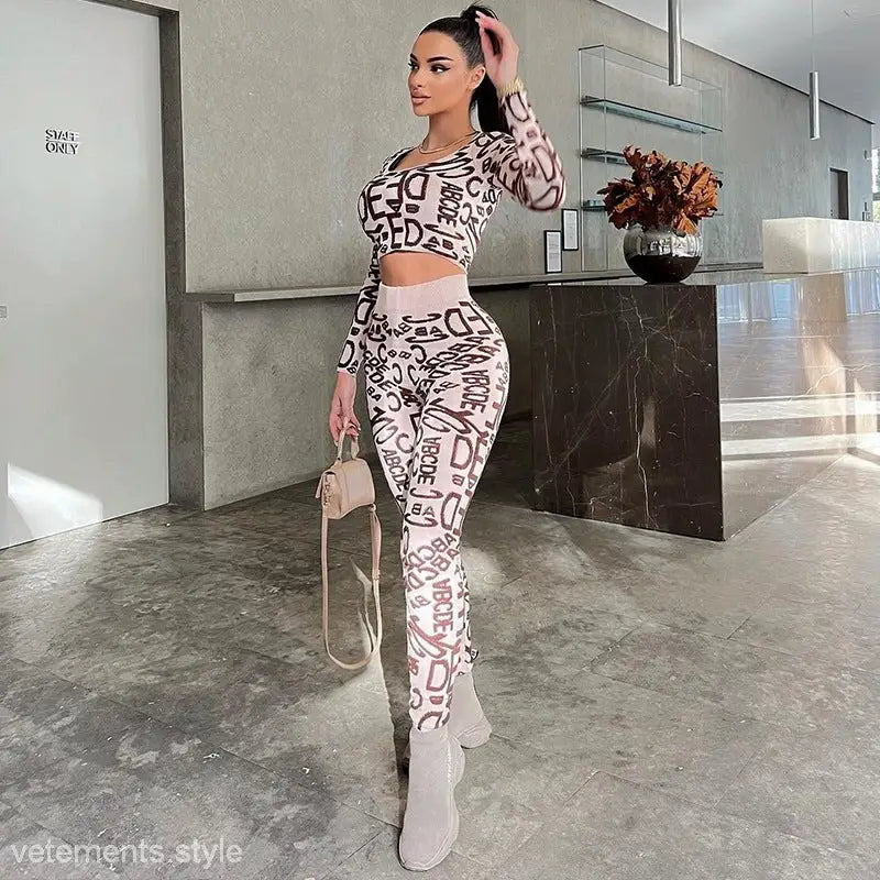 Woman’s letter-print crop top and high waist hip lift leggings suit for elegant style