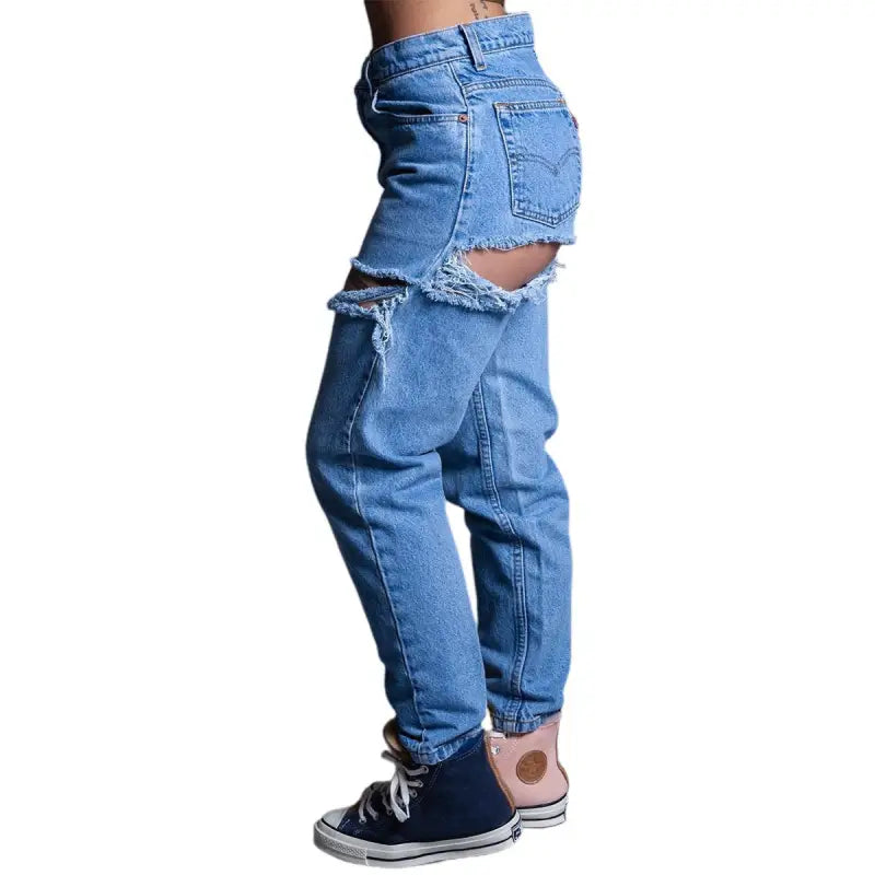 Distressed blue high waist loose jeans with ripped knees and frayed edges for stylish casual wear