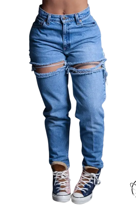 Distressed high waist loose jeans with thigh rips and high-top sneakers