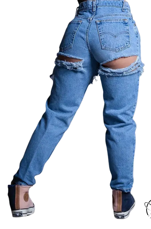 High waist loose jeans with rips exposing thigh skin