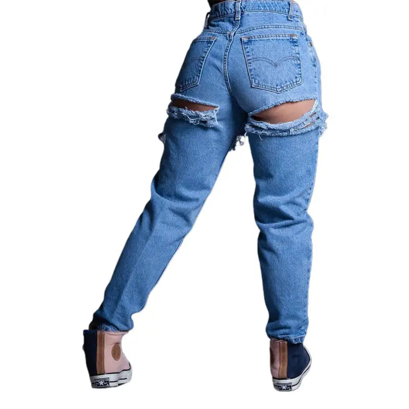 High waist loose jeans with ripped design exposing skin on the back of thighs