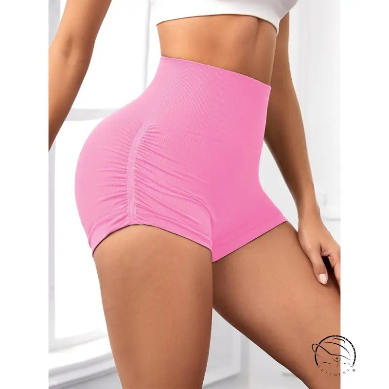 Pink high-waisted peach hip fitness pants with sporty slim ruched design