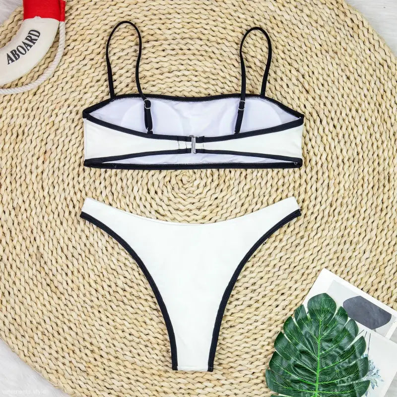 White bikini with black trim and spaghetti straps, ideal high waist sexy bikini for summer