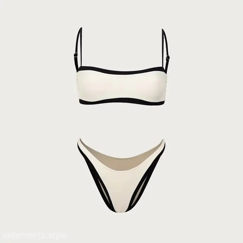 White bikini swimsuit with black trim, perfect for a high waist sexy bikini look