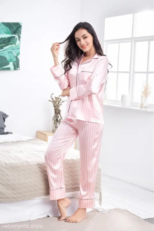 Pink striped satin pajama set with long sleeves and pants, ideal silk striped homewear