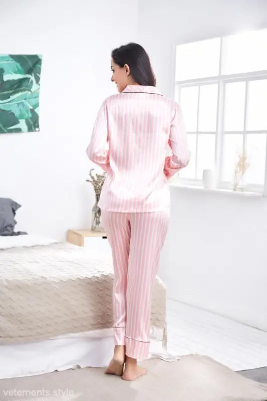 Pink striped satin pajama set worn by woman, ideal imitated silk striped casual homewear