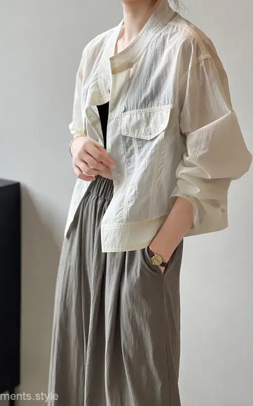 Khaki Green Casual Polyester Shirt showcasing a woman’s light-colored, short summer cardigan with pockets, available with free shipping