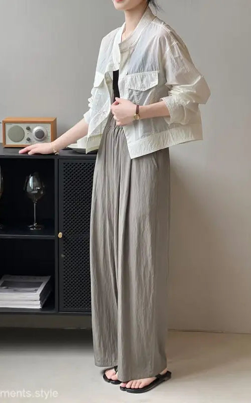 Woman in khaki green casual polyester shirt with white jacket and wide-legged pants, perfect for summer cardigan short, available with free shipping
