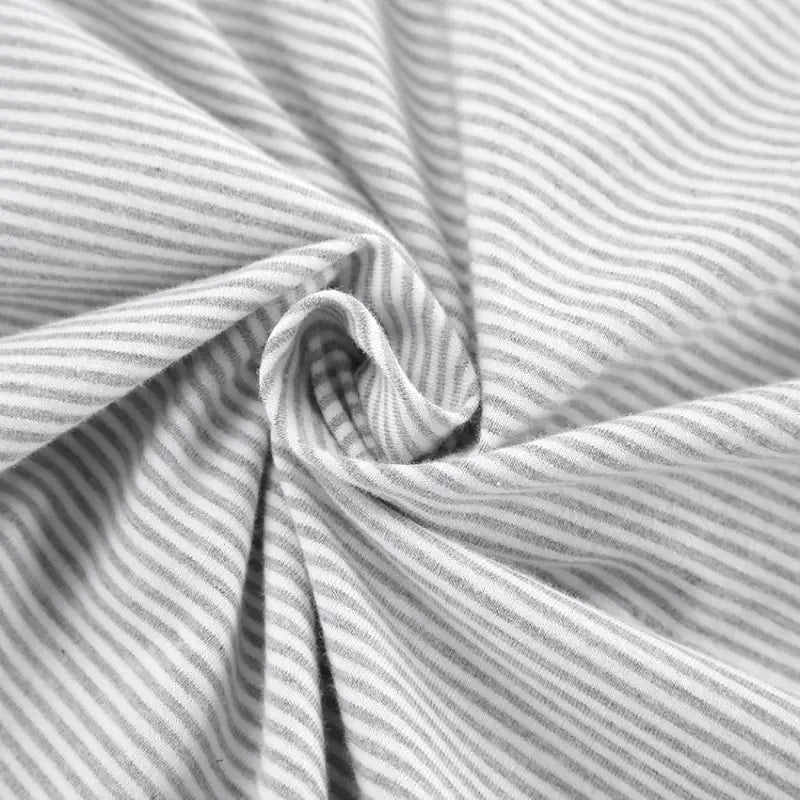 Light grey and white striped knitted loose pajamas fabric with a soft textured surface