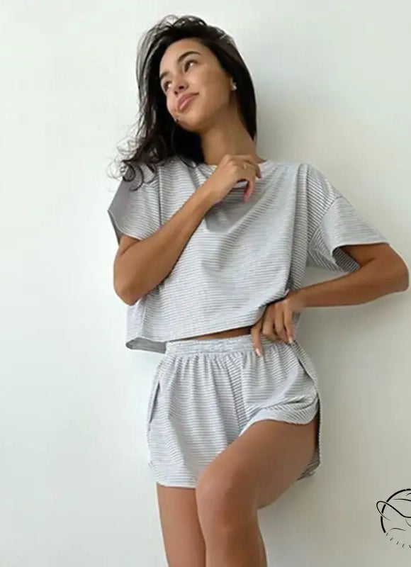 Woman modeling knitted loose pajamas summer stripe split sleeve lounge set in light grey and white