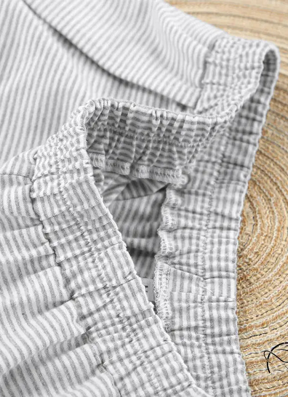 Wrinkled gray and white striped knitted loose pajamas with elastic waistband for summer comfort