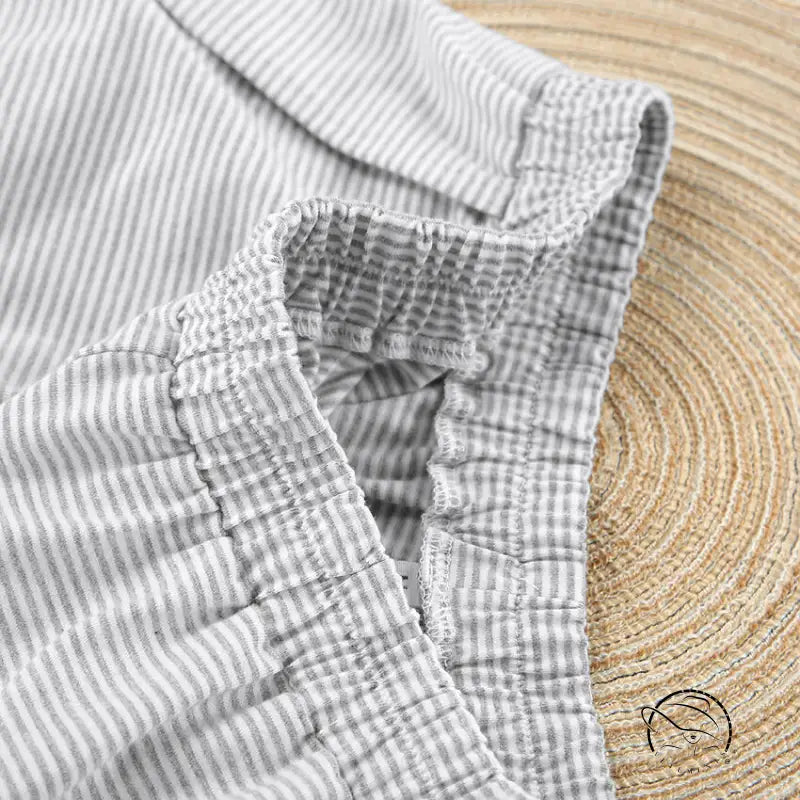 Knitted loose pajamas: wrinkled gray white striped fabric with elastic waistband