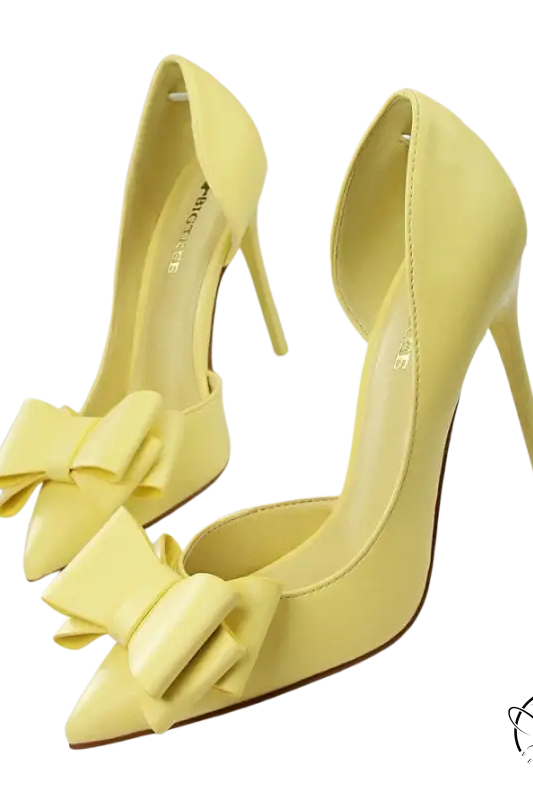 Pair of pale yellow Korean version high heel shoes with bow toes
