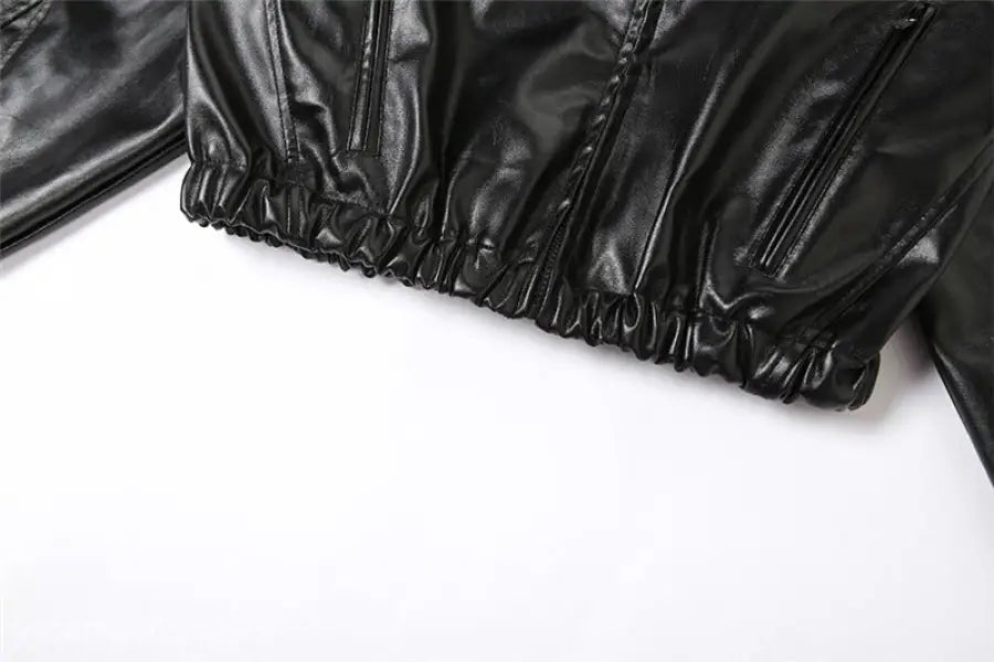 Shiny black Kylie Faux Leather Coat with elastic hem and zipper closure for fall/spring