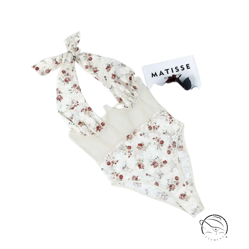 White floral lace teddy bodysuit with steel ring boning and tie halter straps