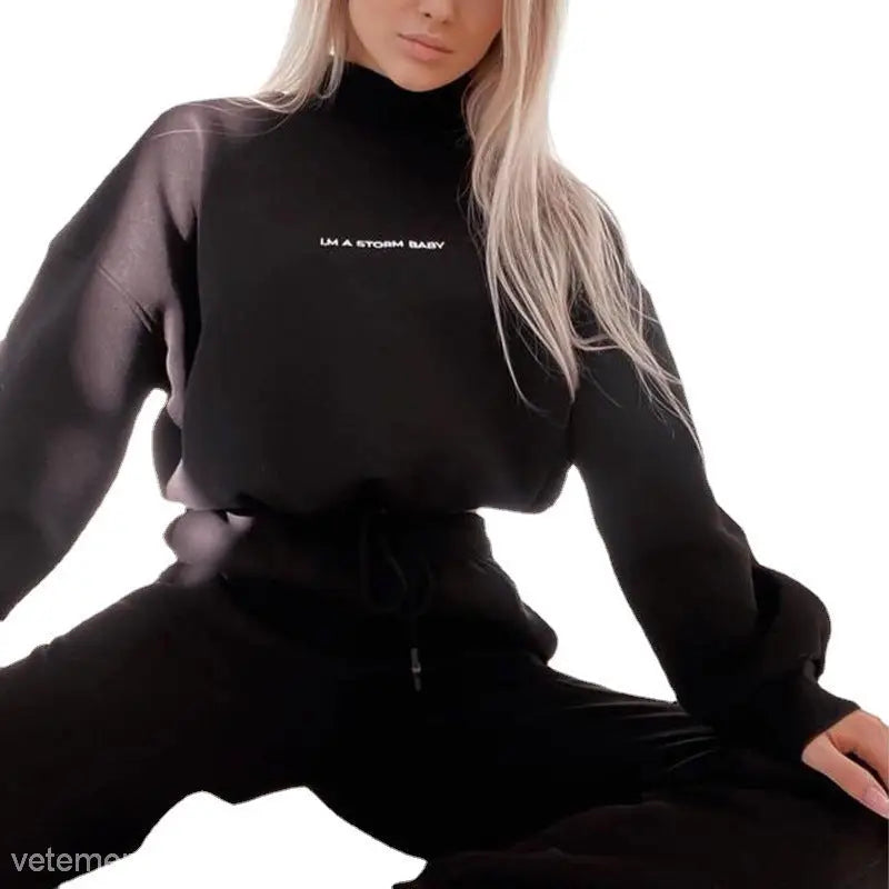 Black turtleneck sweatshirt and sweatpants set from Lanna Alphabet Outfit for winter casual wear