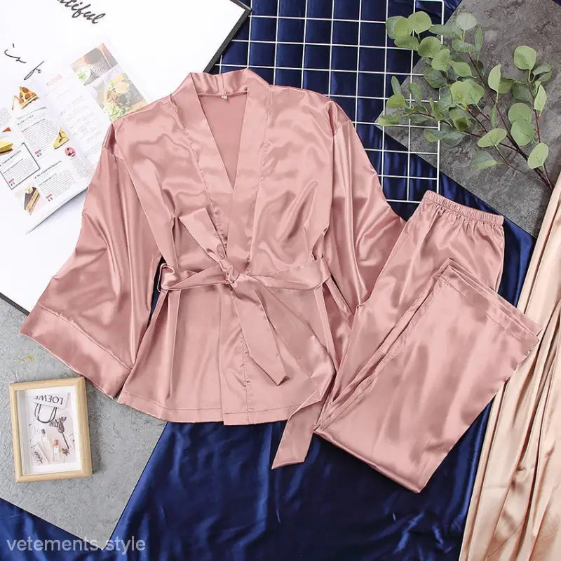 Light brown satin pajamas set with wrap-style top and matching pants for casual wear