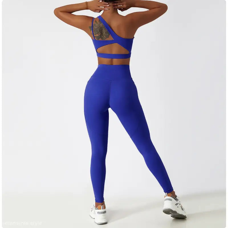 Blue athletic set featuring a Light Gray Blue Sporty Polyester Cutout Back Top