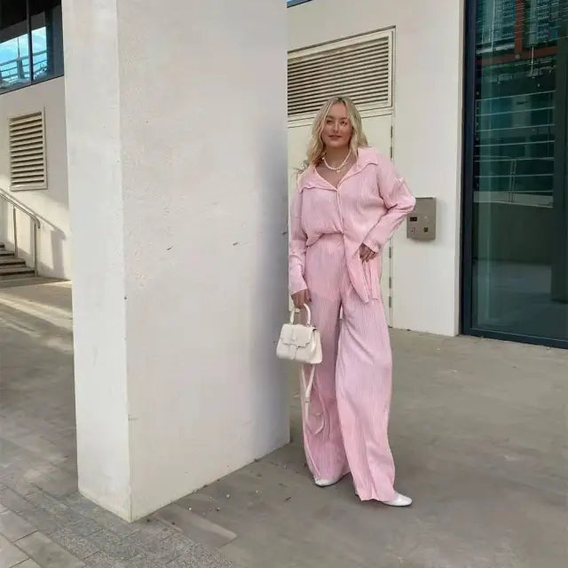 Woman in pink pantsuit modeling the Beautiful Loose Casual Polyester Long Sleeve Top set