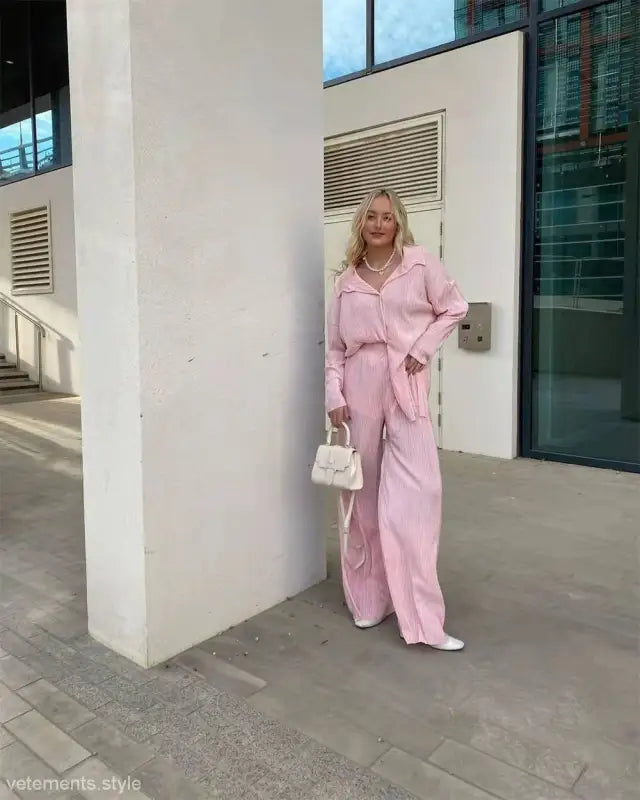 Woman in pink pantsuit modeling the Beautiful Loose Casual Polyester Long Sleeve Top set