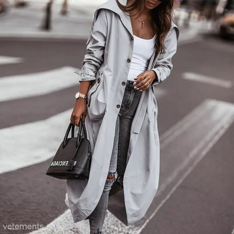 Light Gray Mid Length Trench Coat ideal for Spring and Fall wear displayed elegantly