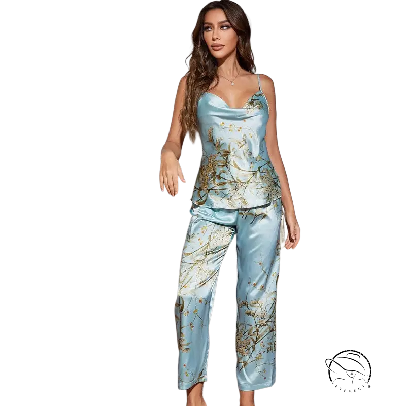 Woman in light green cherry ice silk pajamas set with floral patterns