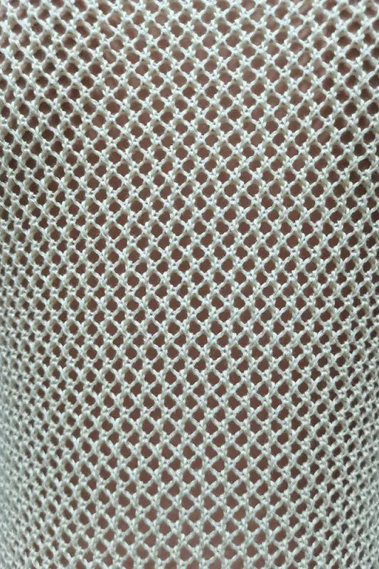 Beige crocheted fishnet garment from Knitted Beach Dress with Elegant Fringe Detail