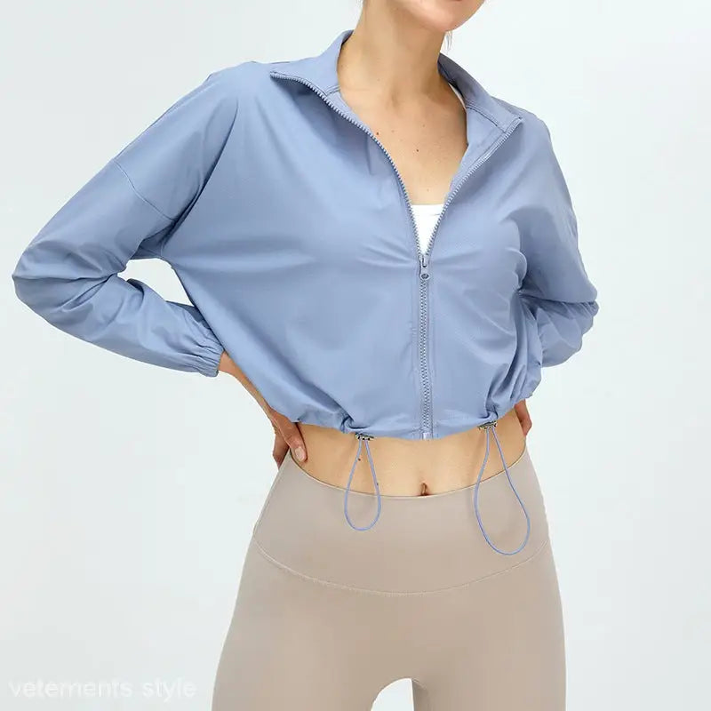 Light blue cropped zip-up jacket with drawstring hem from Running Fitness Clothes collection