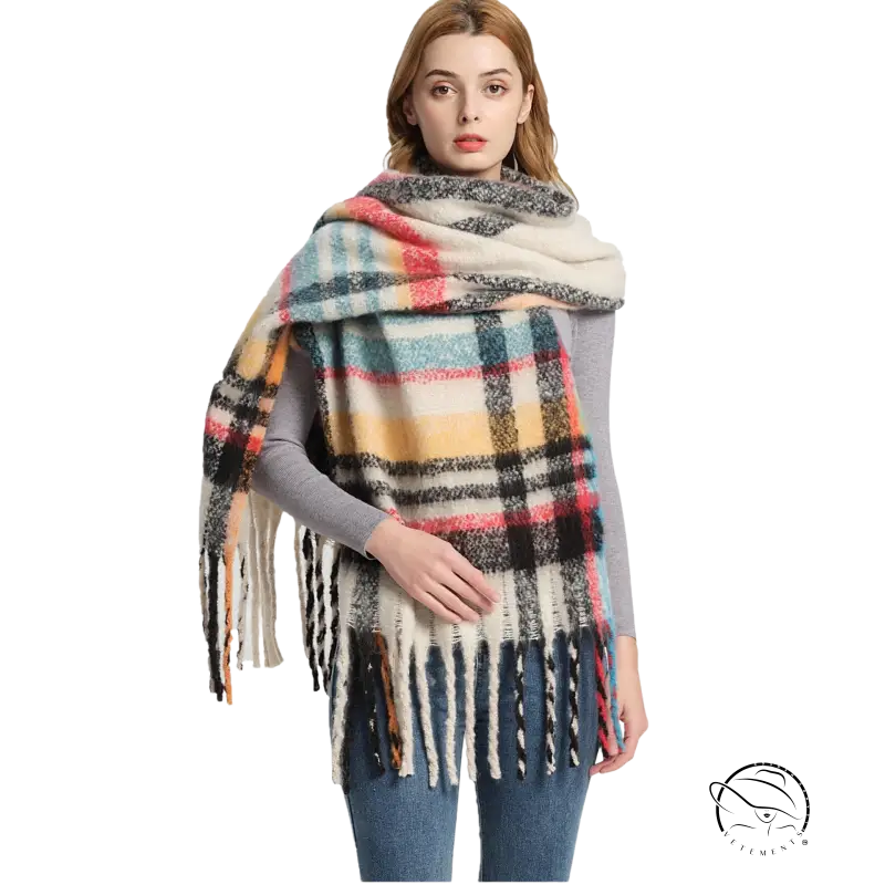 Cozy light pink wool scarf with multicolored plaid and fringed edges