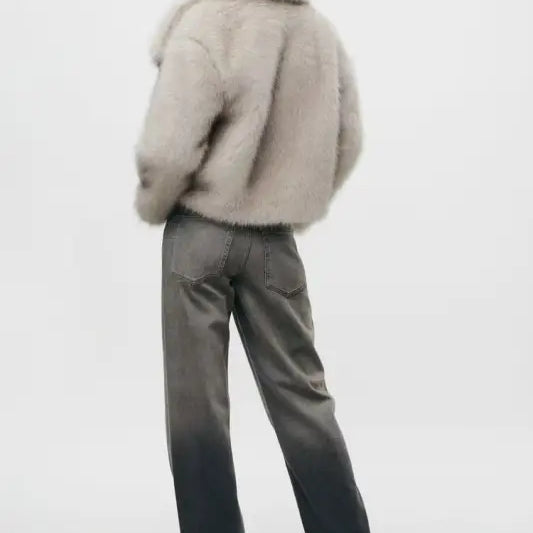 Woman in a fur jacket and ombre jeans showcasing a Loose Padded Urban Jacket