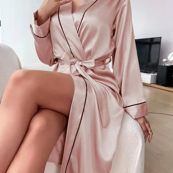 Pink satin robe with black piping, ideal as a sexy cardigan bathrobe or lotus root-inspired piece