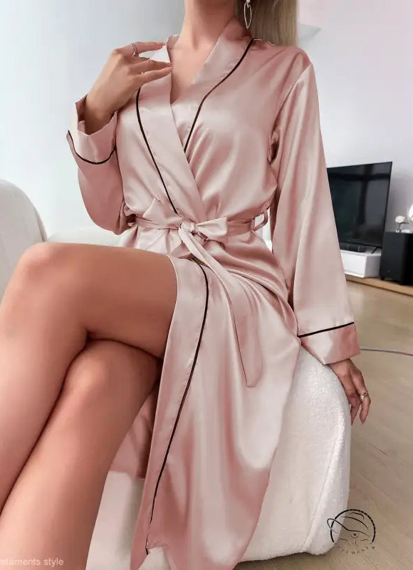Lotus root satin pink robe with black piping and belted sleeves