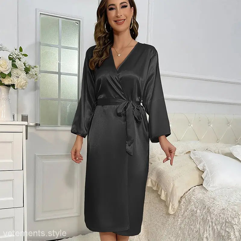 Black satin wrap robe with long sleeves and tie waist, ideal as a lace ice silk ice silk robe for spring and fall