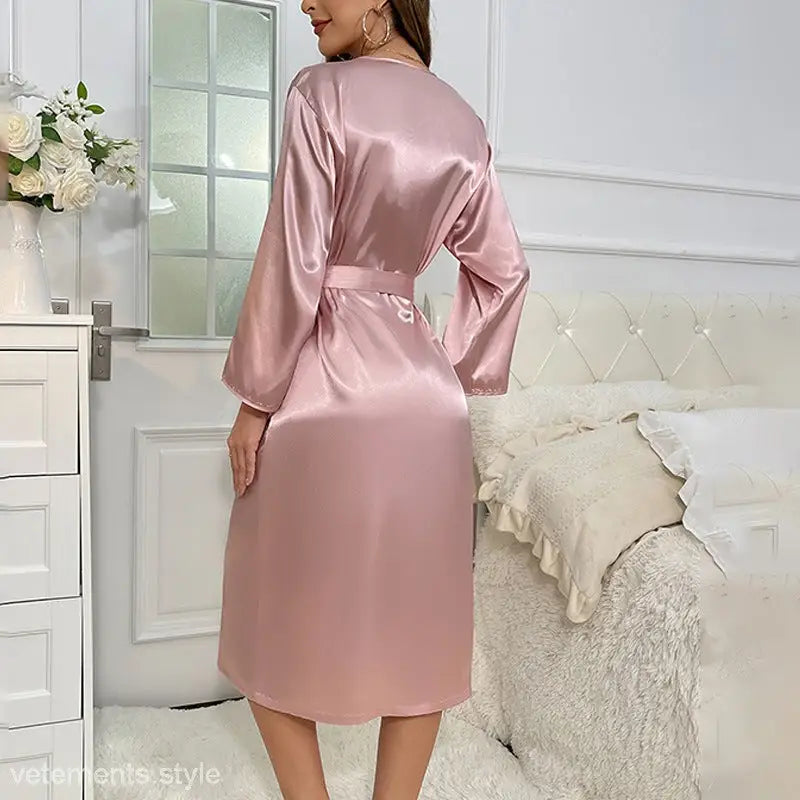 Pink satin robe with long sleeves and belted waist from Lounge Satin Belted Midi Dress collection in lace ice silk for spring and fall