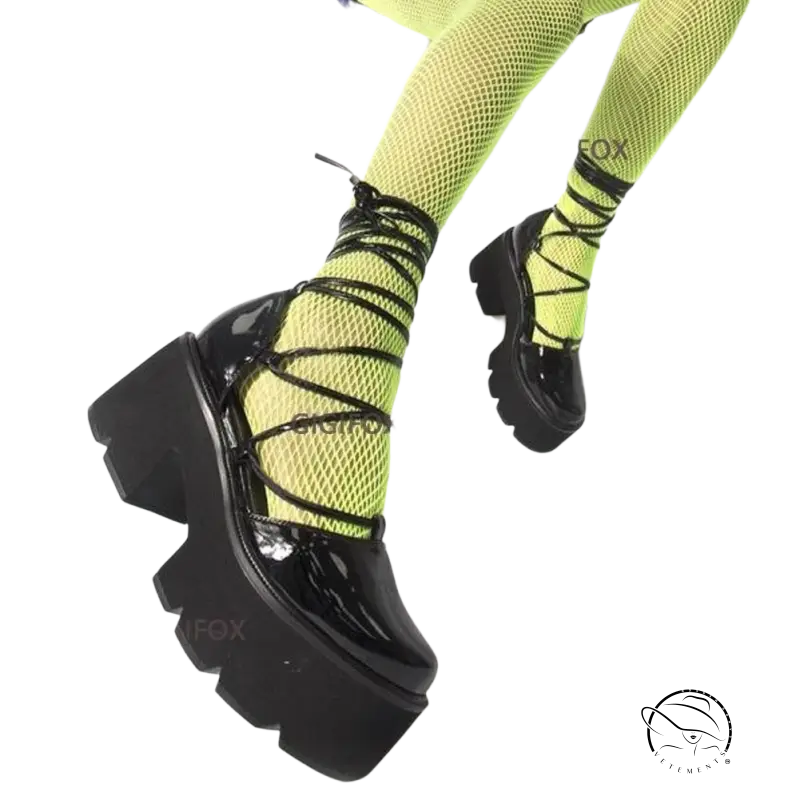 Black patent leather platform boot in lovely style high heels with neon green mesh lace-up
