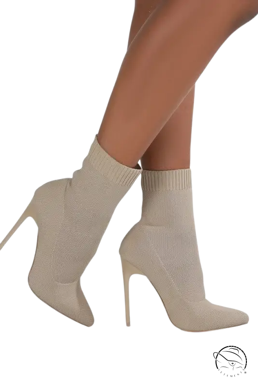 Luxury sock boots in beige with stiletto heels and pointed toes