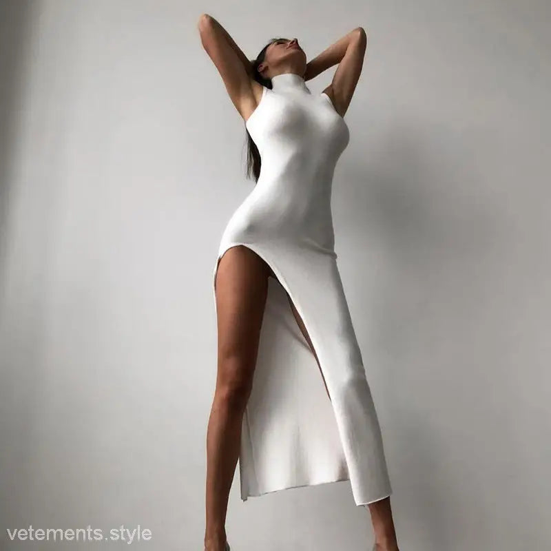 White high-slit Lyla Party Midi Dress showcasing sleeveless slim fit design