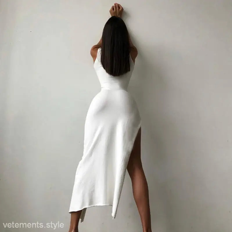 White sleeveless slit dress from Lyla Party Midi Dress collection showcasing sleek slim fit style