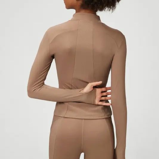 Brown athletic wear set featuring a Matcha Green Long Sleeve Coat with tight waist design