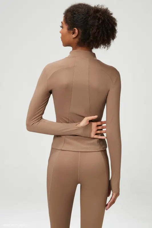 Brown athletic wear set featuring a Matcha Green Long Sleeve Coat with tight waist design