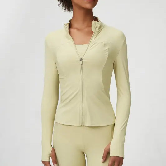 Woman in Matcha Green Long Sleeve Coat with Tight Waist for yoga and athletic pursuits